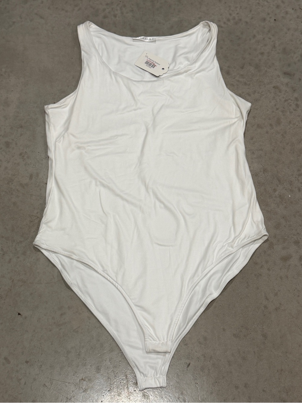White Sleeveless One-Piece Bodysuit
